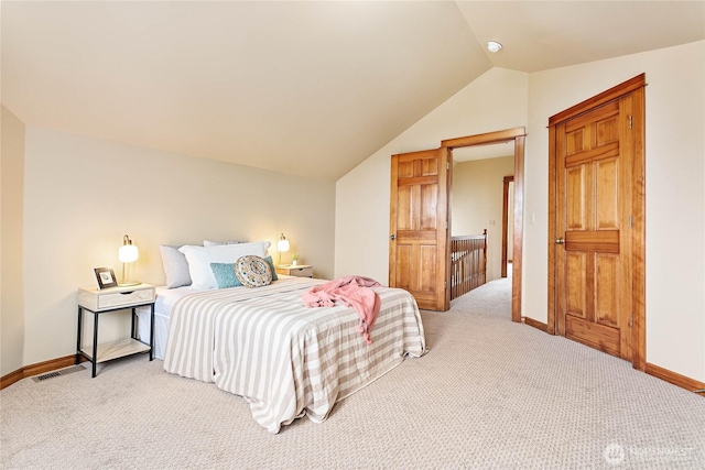 1007 N Forest St, Bellingham, WA 98225 - bedroom with light colored carpet and vaulted ceiling
