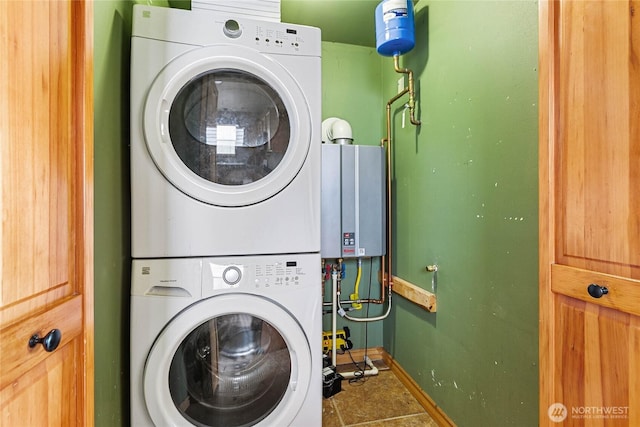 1007 N Forest St, Bellingham, WA 98225 - laundry area featuring stacked washing machine and dryer and water heater