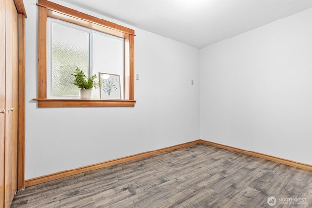 1007 N Forest St, Bellingham, WA 98225 - unfurnished room featuring wood finished floors and baseboards