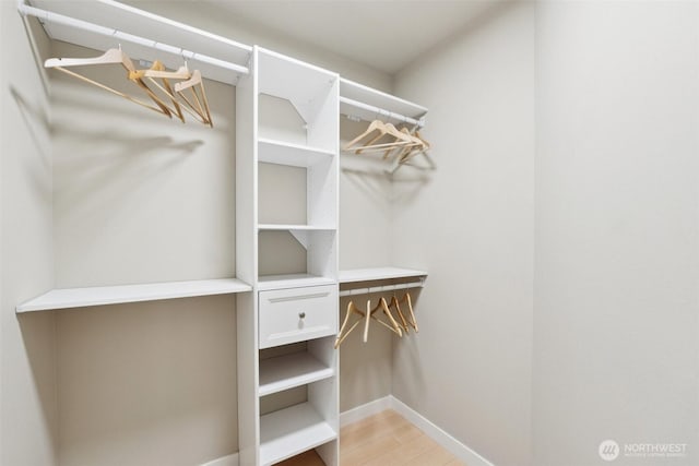 20402 1st Pl W, Lynnwood, WA 98036 - spacious closet featuring wood finished floors