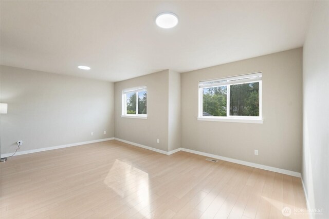 20402 1st Pl W, Lynnwood, WA 98036 - unfurnished room featuring baseboards and light wood finished floors