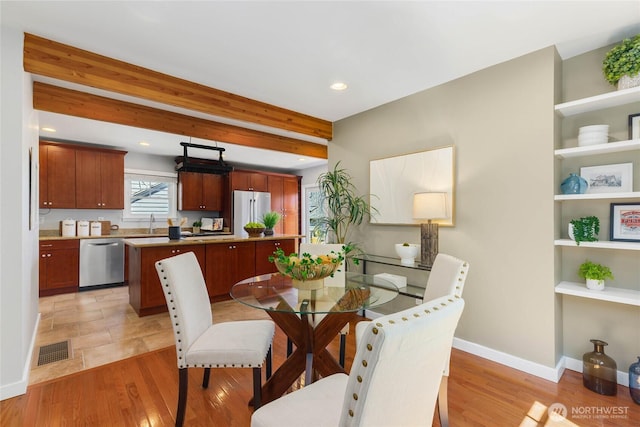 1628 27th Ave, Seattle, WA 98122 - dining area featuring beamed ceiling, light wood-style floors, and recessed lighting