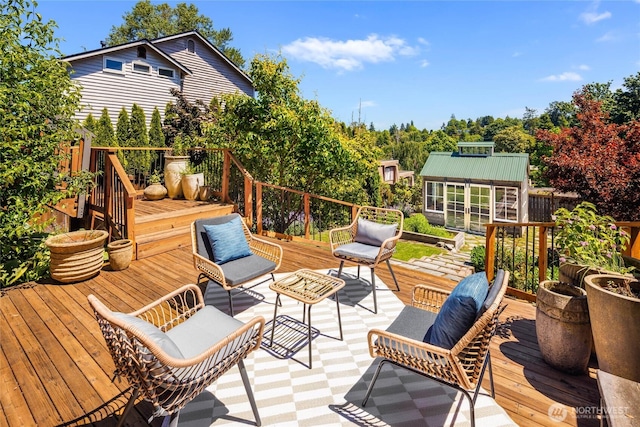 1628 27th Ave, Seattle, WA 98122 - wooden deck with an outdoor hangout area and an outbuilding