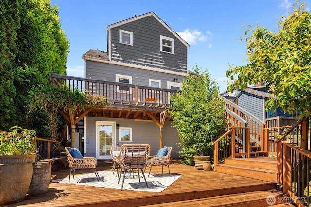 1628 27th Ave, Seattle, WA 98122 - rear view of property with a deck and stairs
