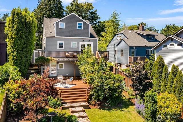 1628 27th Ave, Seattle, WA 98122 - back of house featuring a wooden deck and stairs