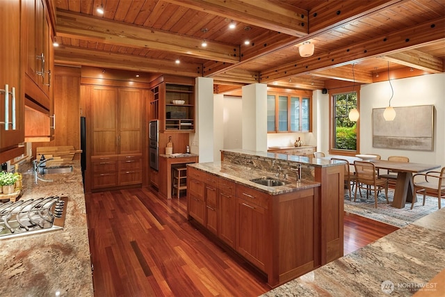 7715 NE 22nd St, Medina, WA 98039 - kitchen featuring brown cabinets, a wooden ceiling with exposed beams, dark wood-style floors, open shelves, and light stone counters