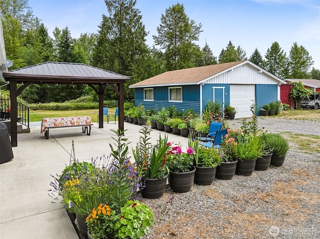 9317 214th Ave E, Bonney Lake, WA 98391 - view of community featuring a gazebo, an outbuilding, and a garage