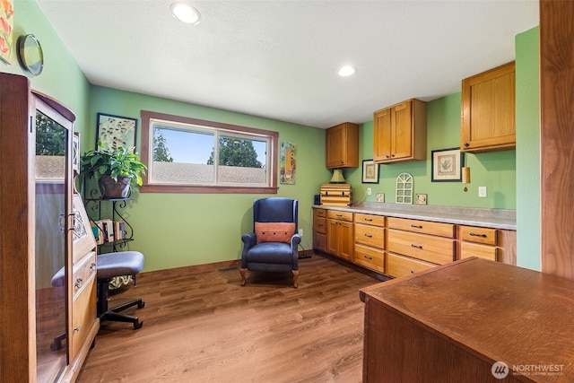 9317 214th Ave E, Bonney Lake, WA 98391 - kitchen featuring wood finished floors and recessed lighting