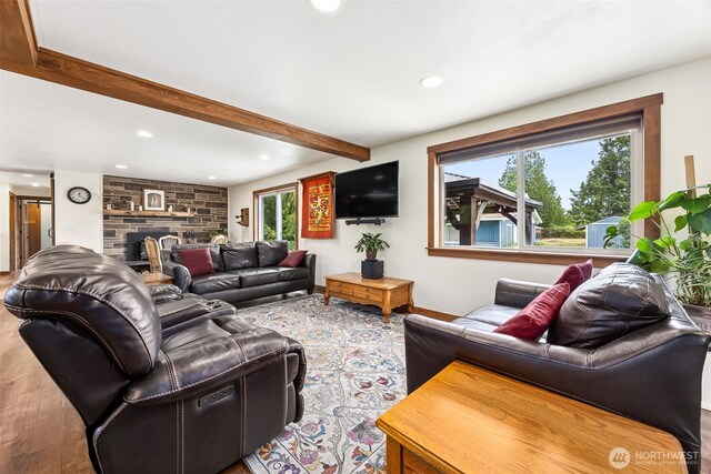 9317 214th Ave E, Bonney Lake, WA 98391 - living area with beamed ceiling, wood finished floors, and recessed lighting