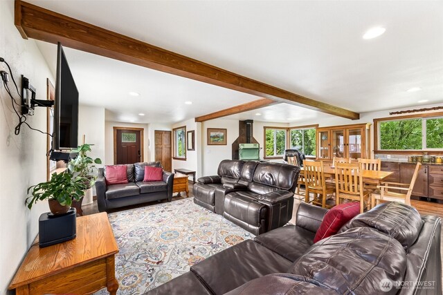 9317 214th Ave E, Bonney Lake, WA 98391 - living room featuring recessed lighting, beam ceiling, and wood finished floors