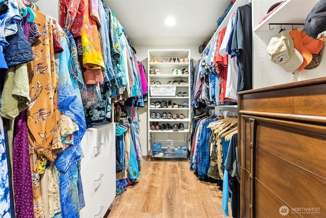 9317 214th Ave E, Bonney Lake, WA 98391 - walk in closet featuring wood finished floors