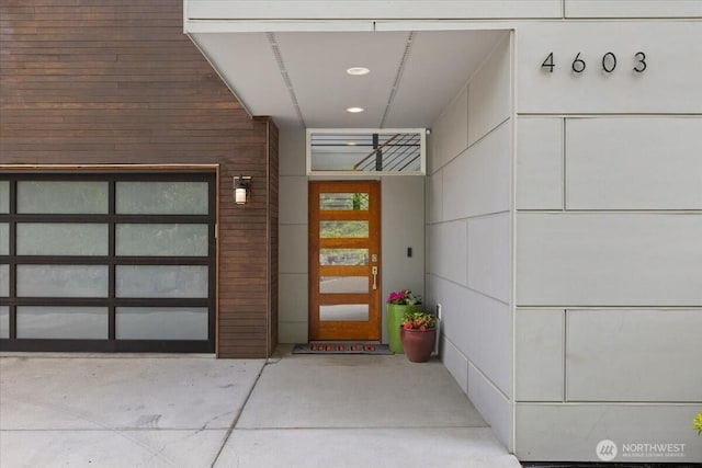 4603 S Juneau St, Seattle, WA 98118 - doorway to property with a garage