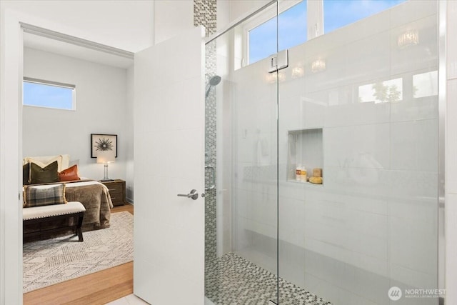 4603 S Juneau St, Seattle, WA 98118 - full bath featuring ensuite bath, a stall shower, and wood finished floors