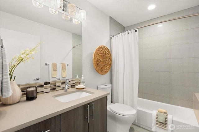 4603 S Juneau St, Seattle, WA 98118 - bathroom featuring vanity, shower / bath combo with shower curtain, backsplash, and recessed lighting