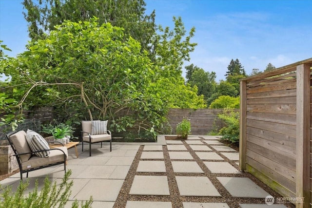 4603 S Juneau St, Seattle, WA 98118 - fenced backyard featuring a patio