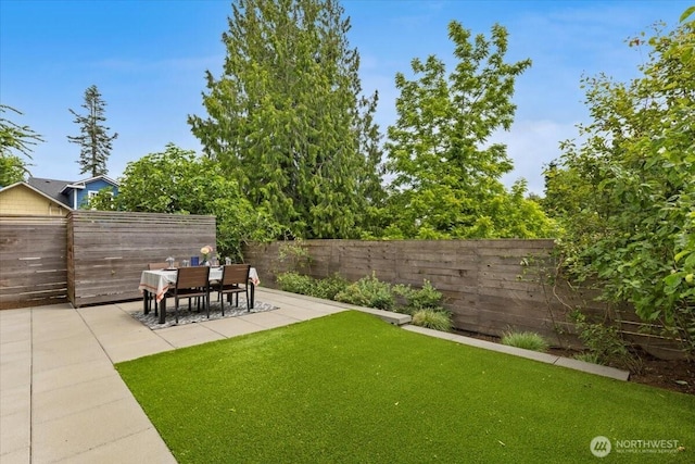 4603 S Juneau St, Seattle, WA 98118 - fenced backyard featuring a patio