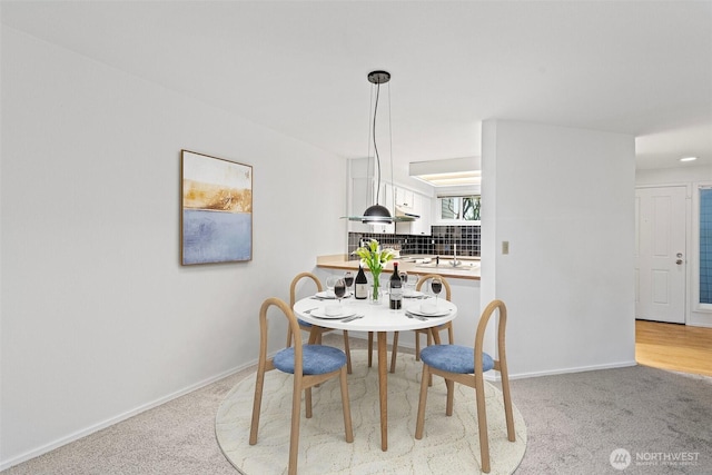 15734 NE 70th Ct Unit 15734, Redmond, WA 98052 - dining area featuring light carpet and baseboards