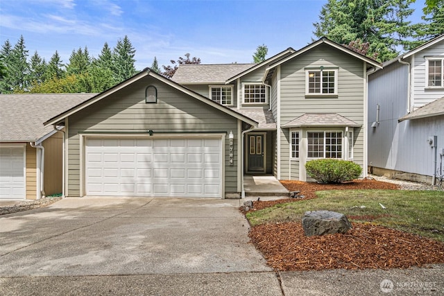 3724 30th Ave SE, Olympia, WA 98501 - traditional home featuring concrete driveway, an attached garage, and a shingled roof