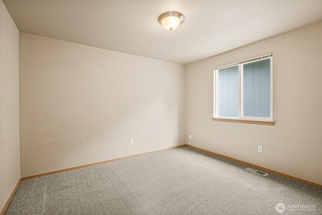 3724 30th Ave SE, Olympia, WA 98501 - carpeted empty room featuring baseboards
