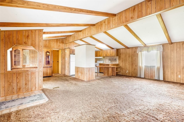 2240 W Broadway Ave Unit 22, Moses Lake, WA 98837 - unfurnished living room featuring carpet and wooden walls