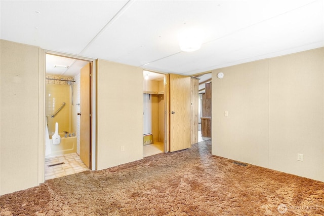 2240 W Broadway Ave Unit 22, Moses Lake, WA 98837 - unfurnished bedroom with carpet floors and ensuite bath