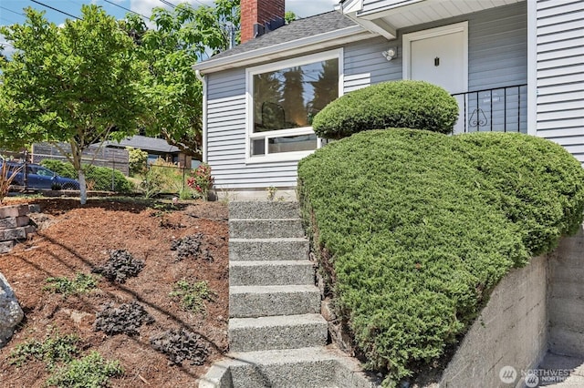 8902 17th Ave NE, Seattle, WA 98115 - entrance to property with a chimney and a shingled roof
