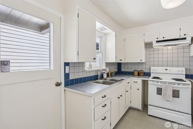 8902 17th Ave NE, Seattle, WA 98115 - kitchen featuring white electric range oven, under cabinet range hood, tasteful backsplash, and white cabinets