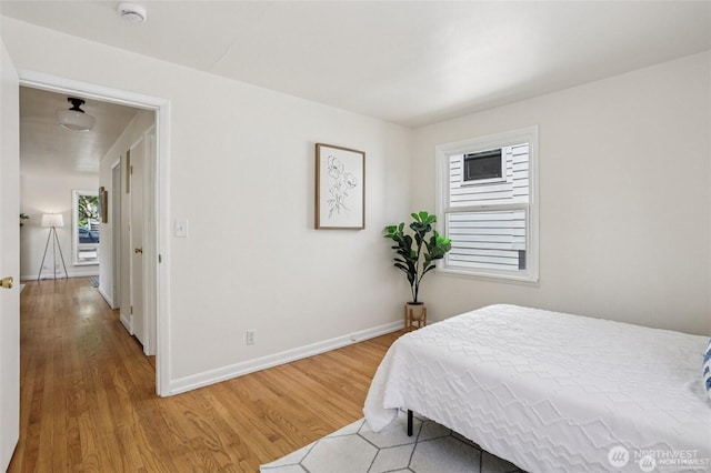 8902 17th Ave NE, Seattle, WA 98115 - bedroom with light wood finished floors and baseboards