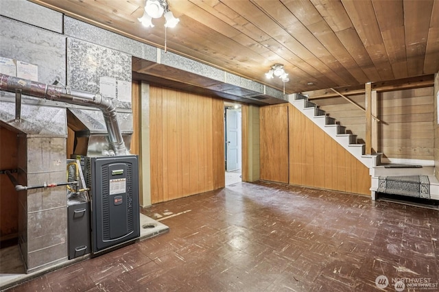 8902 17th Ave NE, Seattle, WA 98115 - finished below grade area with stairs, wooden walls, tile patterned floors, and a wood stove