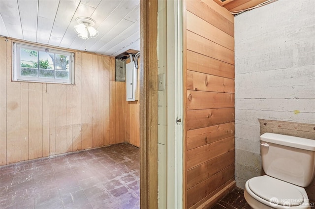 8902 17th Ave NE, Seattle, WA 98115 - bathroom featuring wooden walls, tile patterned floors, and electric panel