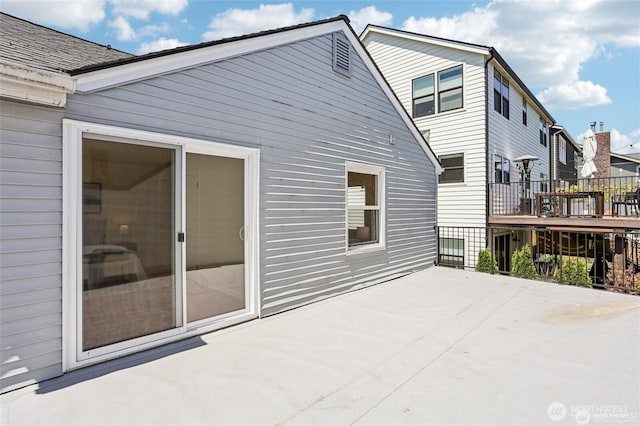 8902 17th Ave NE, Seattle, WA 98115 - rear view of property with a wooden deck and a patio