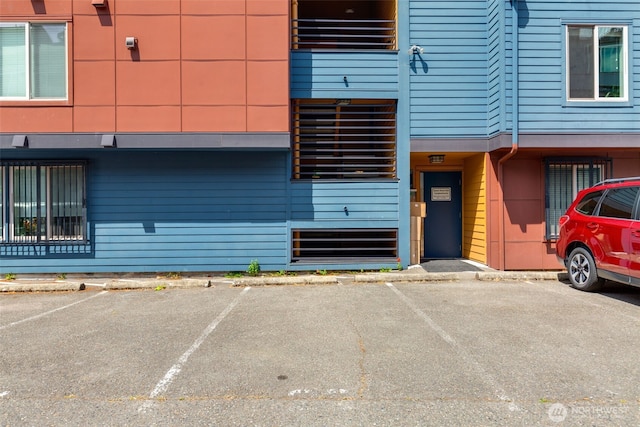 29 Etruria St Unit B505, Seattle, WA 98109 - view of exterior entry featuring uncovered parking