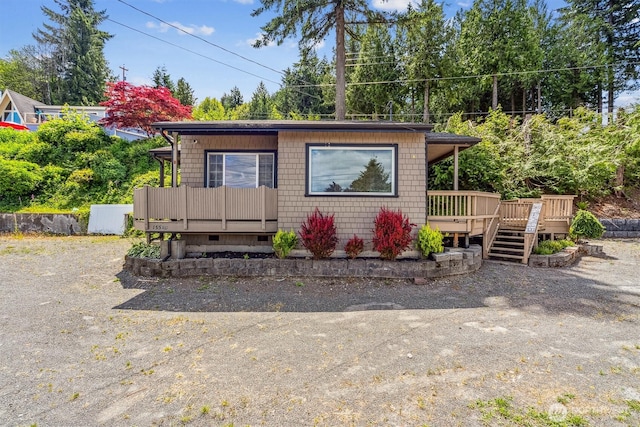 13540 E State Route 106, Belfair, WA 98528 - view of front facade featuring a deck