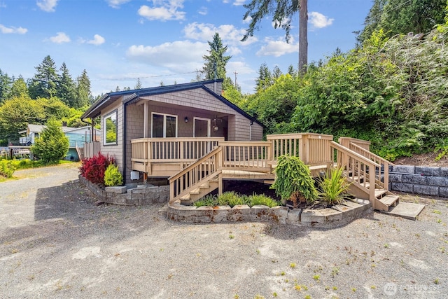 13540 E State Route 106, Belfair, WA 98528 - view of front of property featuring a wooden deck and stairs