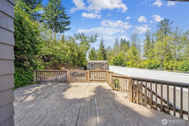 13540 E State Route 106, Belfair, WA 98528 - deck featuring a storage unit and a fenced backyard