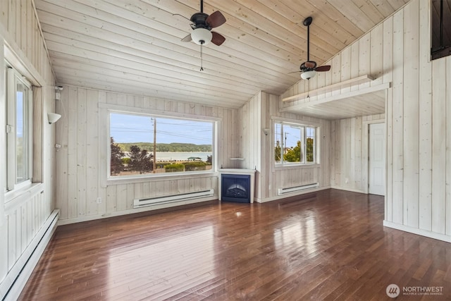 13540 E State Route 106, Belfair, WA 98528 - unfurnished living room with a baseboard heating unit, ceiling fan, hardwood / wood-style flooring, vaulted ceiling, and wood walls