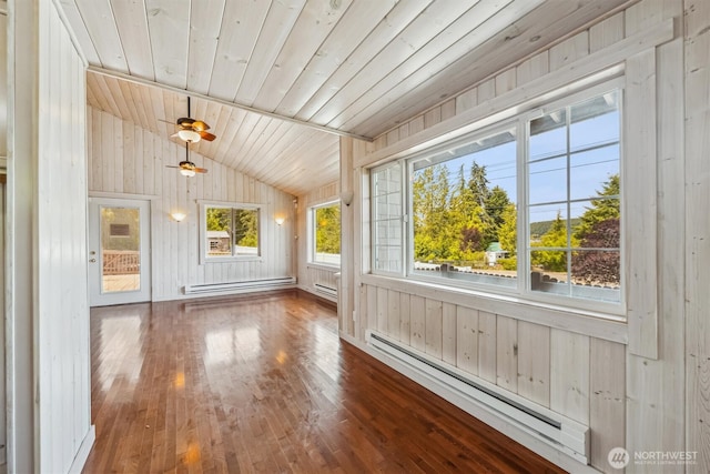 13540 E State Route 106, Belfair, WA 98528 - unfurnished sunroom with a baseboard heating unit, lofted ceiling, wood walls, wood finished floors, and baseboard heating