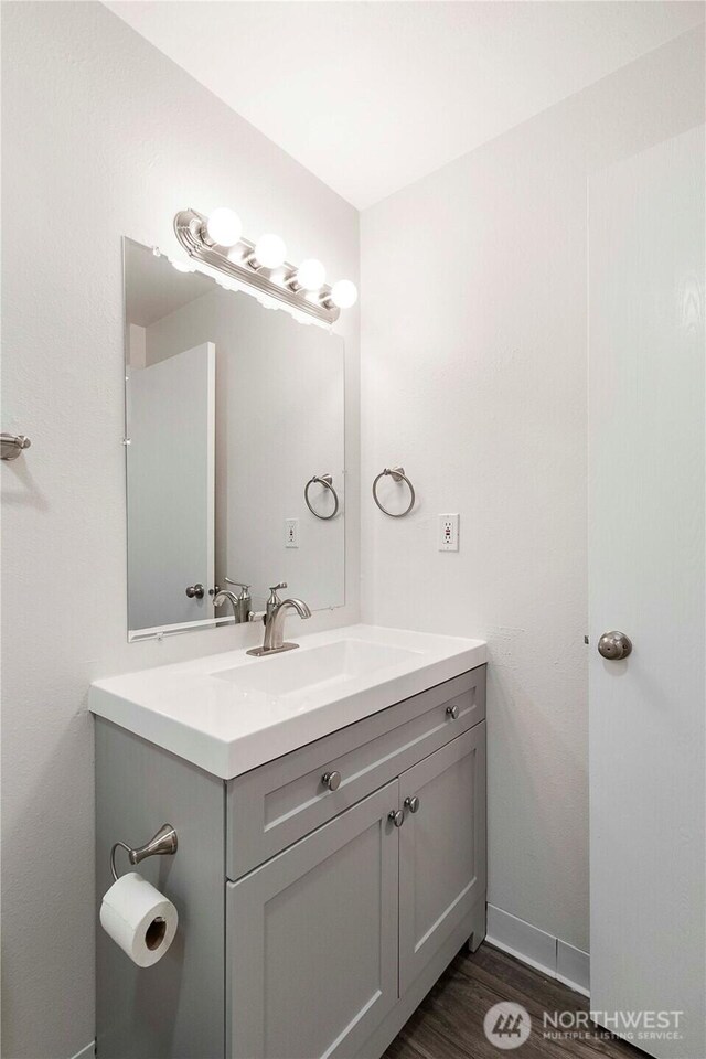 3834 D Pl SE, Auburn, WA 98002 - bathroom with vanity and wood finished floors