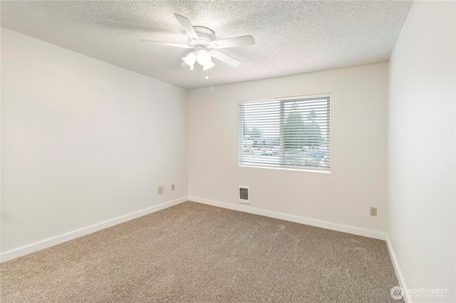 3834 D Pl SE, Auburn, WA 98002 - unfurnished room with carpet, ceiling fan, and a textured ceiling
