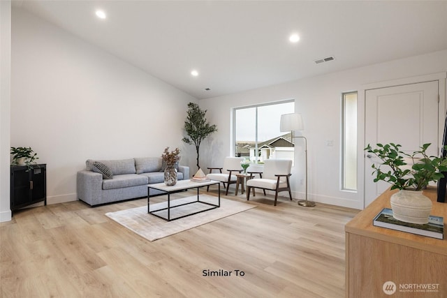 314 N Sandy Loop, Moses Lake, WA 98837 - living room featuring light wood finished floors, vaulted ceiling, and recessed lighting