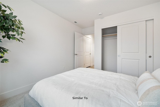 314 N Sandy Loop, Moses Lake, WA 98837 - carpeted bedroom with baseboards and a closet
