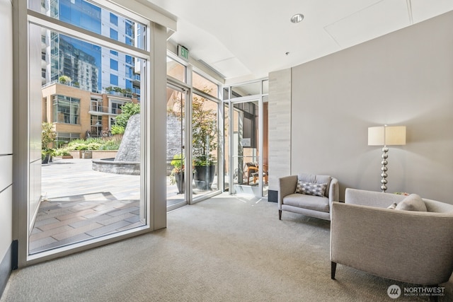 10610 NE 9th Pl Unit C4210, Bellevue, WA 98004 - living area with floor to ceiling windows and carpet