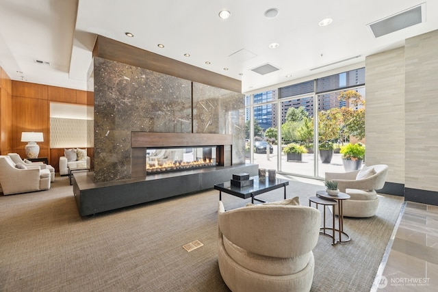 10610 NE 9th Pl Unit C4210, Bellevue, WA 98004 - building lobby with floor to ceiling windows, wood walls, and recessed lighting
