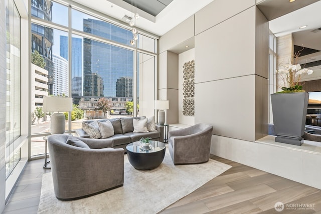 10610 NE 9th Pl Unit C4210, Bellevue, WA 98004 - building lobby with floor to ceiling windows, a city view, and a towering ceiling