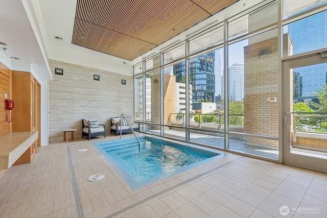 10610 NE 9th Pl Unit C4210, Bellevue, WA 98004 - view of swimming pool featuring a view of city and a pool