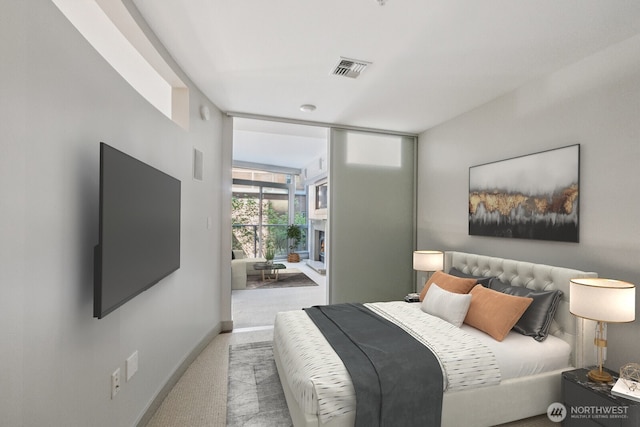 10610 NE 9th Pl Unit C4210, Bellevue, WA 98004 - bedroom featuring carpet floors and a wall of windows
