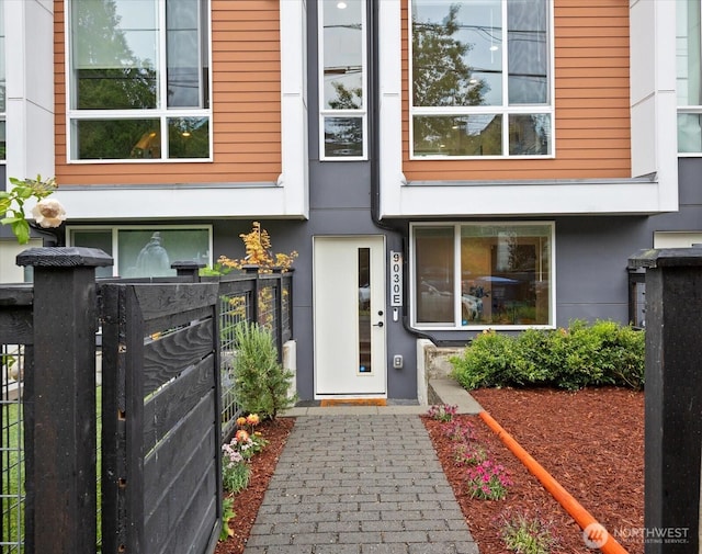 9030 18th Ave SW Unit E, Seattle, WA 98106 - view of exterior entry with stucco siding