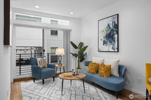 9030 18th Ave SW Unit E, Seattle, WA 98106 - sitting room featuring wood finished floors and recessed lighting