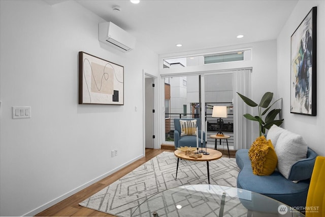 9030 18th Ave SW Unit E, Seattle, WA 98106 - living area with a wall mounted AC, wood finished floors, and recessed lighting