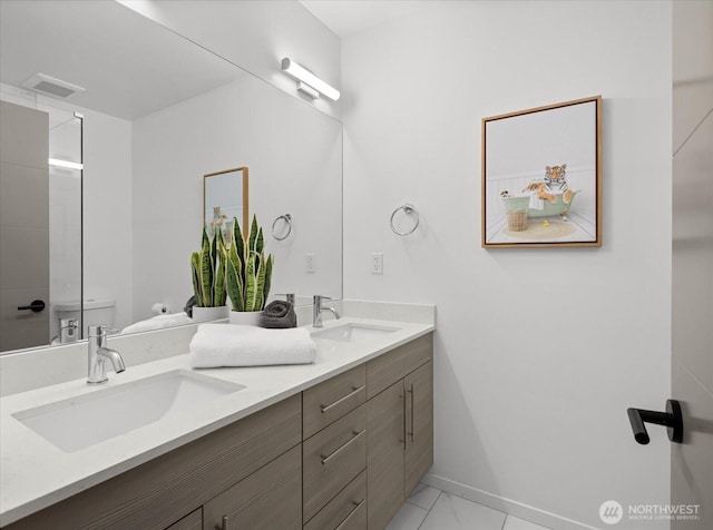 9030 18th Ave SW Unit E, Seattle, WA 98106 - full bathroom featuring double vanity and toilet
